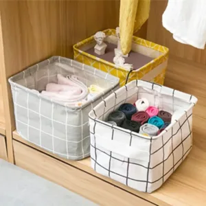 Mini panier de rangement pliable en tissu avec motifs, parfait pour organiser de petits objets dans des espaces réduits