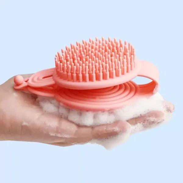 Brosse de douche en silicone 2-en-1 avec distributeur de savon, idéale pour exfolier et masser la peau.