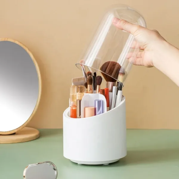 Organisateur de pinceaux de maquillage avec couvercle transparent anti-poussière.