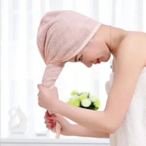 Bonnet de douche en microfibre ultra-doux et absorbant pour protéger les cheveux de l'humidité.