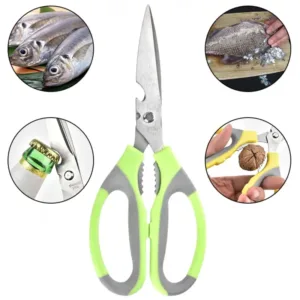 Ciseaux ergonomiques avec support magnétique pour rangement pratique.