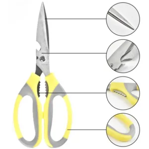 Ciseaux ergonomiques avec support magnétique pour rangement pratique.