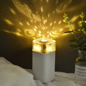 Humidificateur d’air avec projecteur étoilé et lumières LED multicolores.