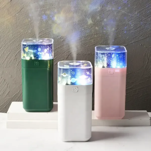 Humidificateur d’air avec projecteur étoilé et lumières LED multicolores.