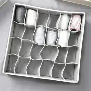 Organiseur de tiroir en tissu avec plusieurs compartiments pour rangement pratique.