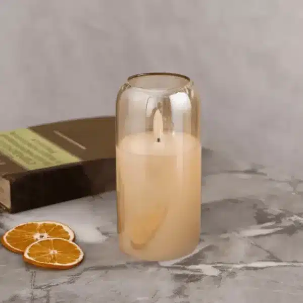 Bougie LED électrique avec flamme réaliste dans verre teinté pour décoration élégante au Maroc