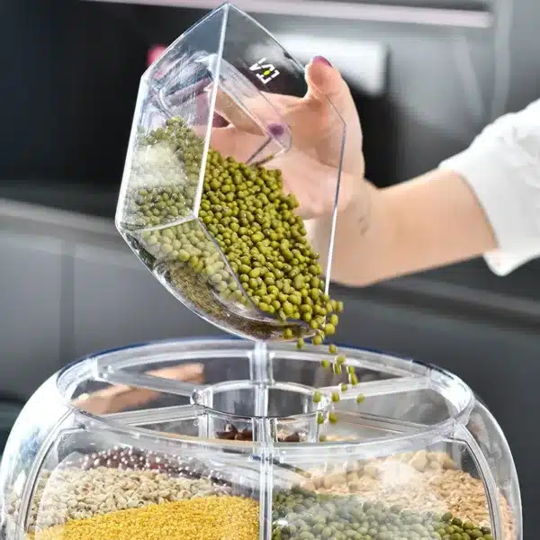 Distributeur rotatif de céréales et légumineuses avec compartiments hermétiques, design moderne pour une cuisine organisée.