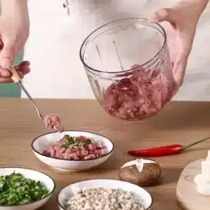Hachoir manuel multifonction avec tirette pour hacher, mixer et émulsionner en cuisine