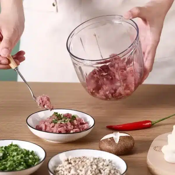 Hachoir manuel multifonction avec tirette pour hacher, mixer et émulsionner en cuisine