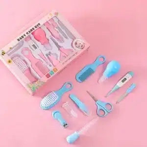 Kit de soin bébé complet avec brosse, peigne, thermomètre, coupe-ongles et accessoires d’hygiène pour nouveau-né.