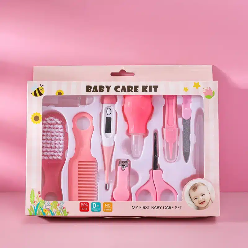 kit-de-soin-bebe-complet-10-en-1-rose Kit de soin bébé complet avec brosse, peigne, thermomètre, coupe-ongles et accessoires d’hygiène pour nouveau-né.