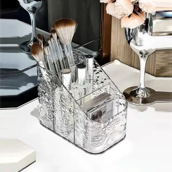 Organisateur de maquillage en acrylique transparent avec compartiments de rangement.