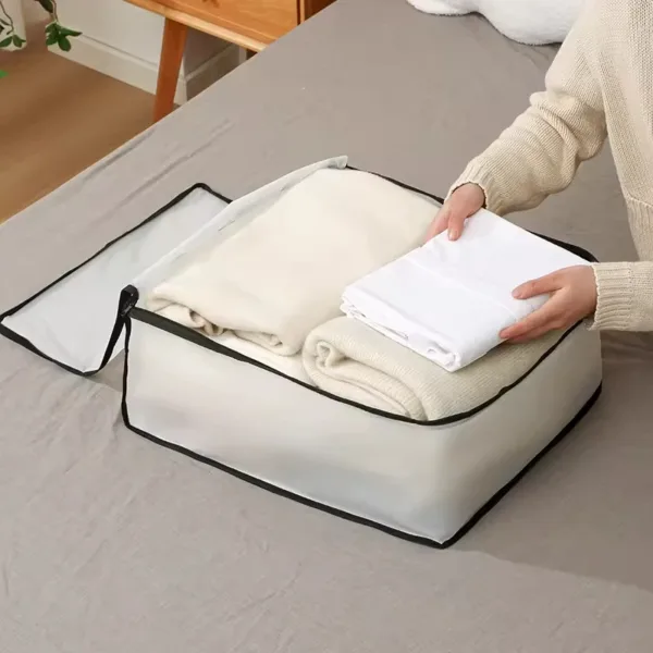 Sac de rangement pliable pour couette avec fermeture éclair et poignées