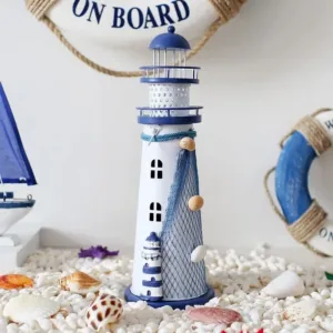 Décoration phare marin en résine blanche et bleue, parfaite pour une ambiance marine et élégante.