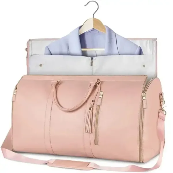 Grand sac de cabine noir posé sur une valise