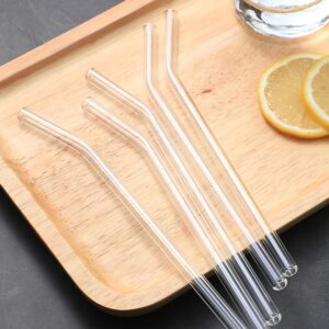 Pailles en verre réutilisables transparentes dans un verre