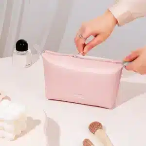 Trousse de maquillage pastel zippée élégante pour rangement cosmétique