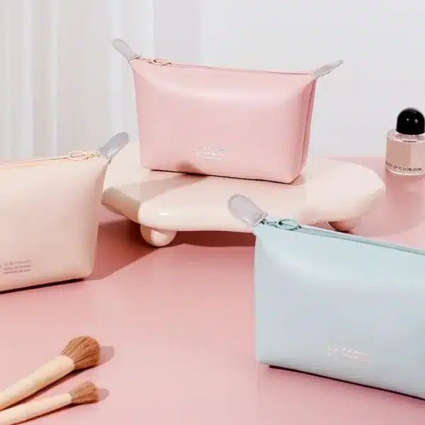 Trousse de maquillage pastel zippée élégante pour rangement cosmétique