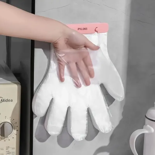 Gants jetables transparents accrochés au mur avec distributeur pratique pour cuisine ou ménage – Maroc
