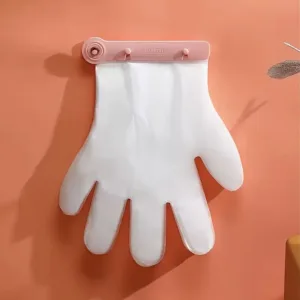 Gants jetables transparents accrochés au mur avec distributeur pratique pour cuisine ou ménage – Maroc