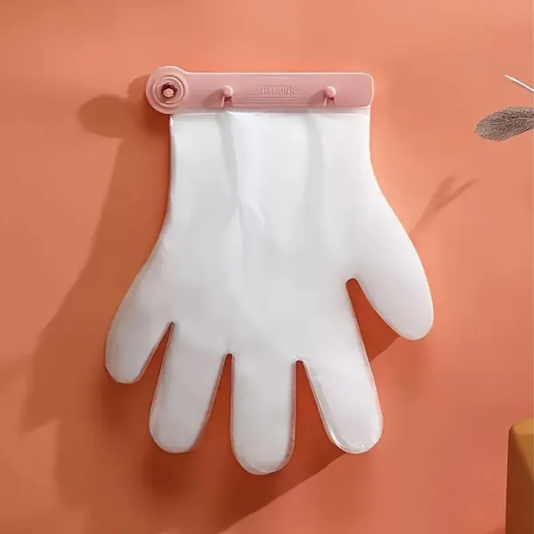 Gants jetables transparents accrochés au mur avec distributeur pratique pour cuisine ou ménage – Maroc