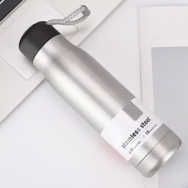 Gourde isotherme inox noire 550 ml design avec dragonne