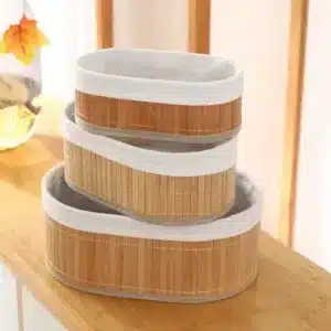 Paniers de rangement ovale en bambou avec doublure en tissu beige