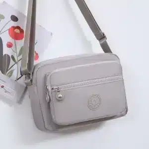 Sac bandoulière femme noir multifonction avec poches zippées – nylon imperméable – Casablanca Maroc