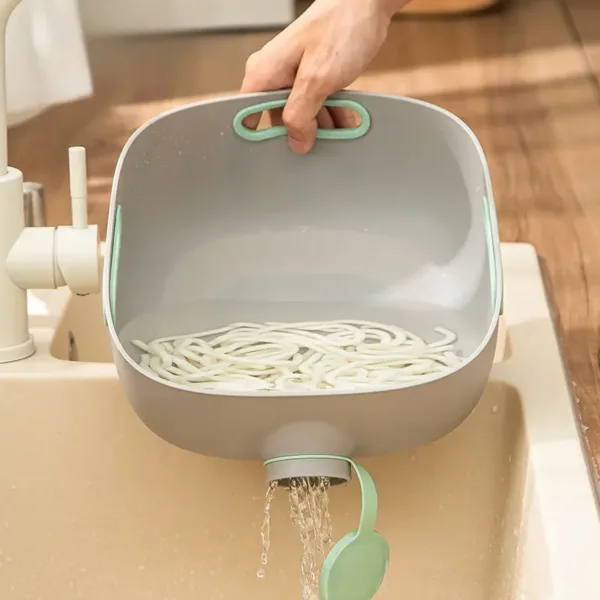 Bassine de cuisine grise avec bouchon de vidange vert pour égoutter légumes ou pâtes