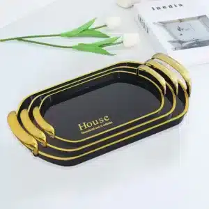 Plateaux de service noir et or avec poignées dorées élégantes