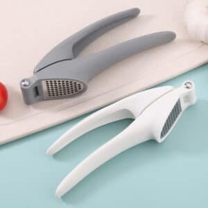 Presse ail manuel en plastique avec grille inox