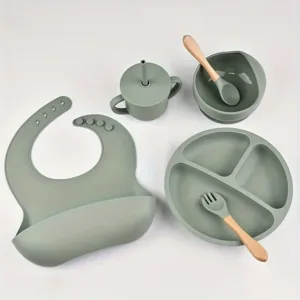 Set de vaisselle bébé en silicone alimentaire vert avec bavoir, assiette compartimentée, bol, gobelet et couverts