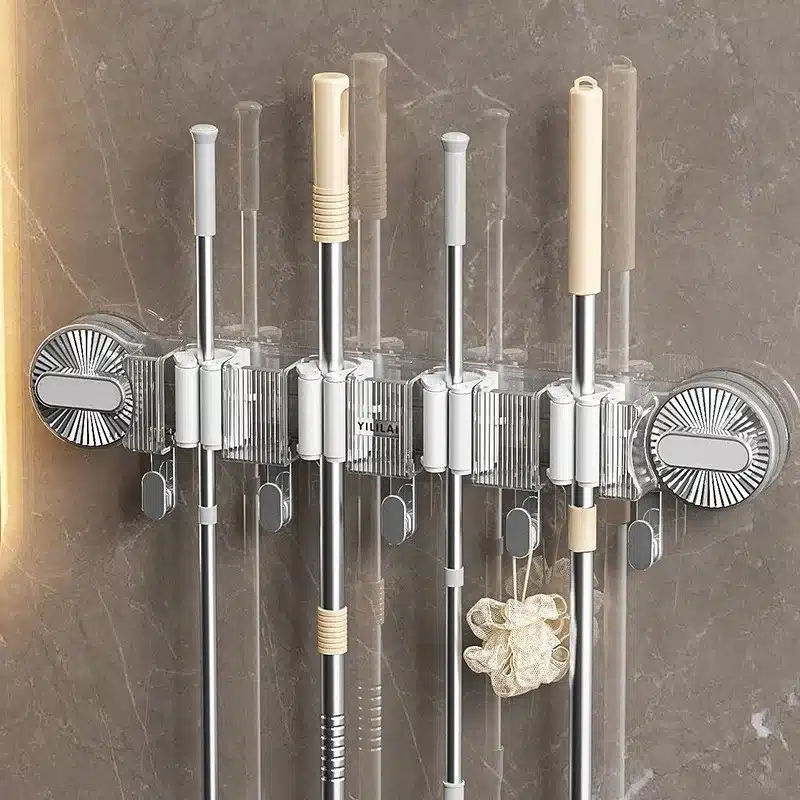 support-mural-pour-balais-et-serpillieres-ventouse-transparent Support mural multifonction pour balais et serpillières avec crochets – couleur gris