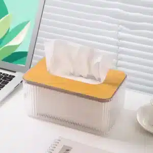 Boîte à mouchoirs design avec couvercle en bois sur un bureau moderne