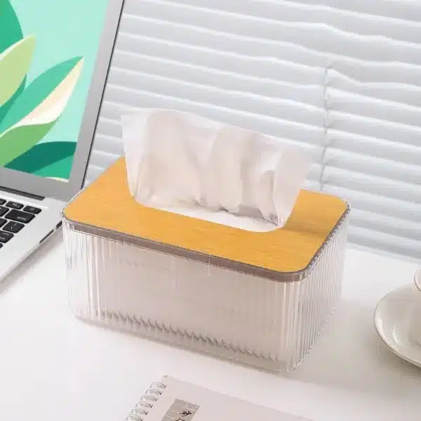 Boîte à mouchoirs design avec couvercle en bois sur un bureau moderne