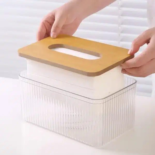 Boîte à mouchoirs design avec couvercle en bois sur un bureau moderne
