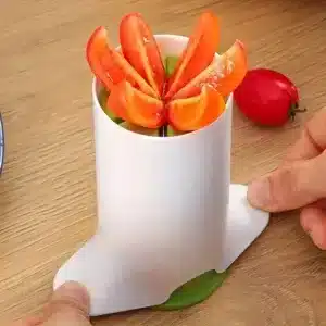 Découpe légumes pratique coupant tomates en quartiers égaux