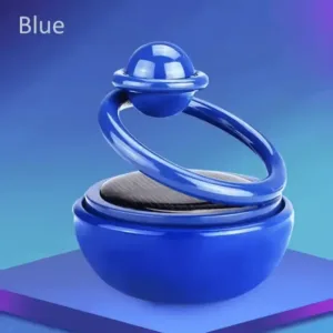 Diffuseur de parfum solaire pour voiture en forme de planète posé sur le tableau de bord au Maroc