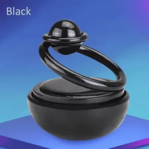 Diffuseur de parfum solaire pour voiture en forme de planète posé sur le tableau de bord au Maroc