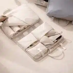 Organisateur de vêtements pliable de voyage avec plusieurs compartiments