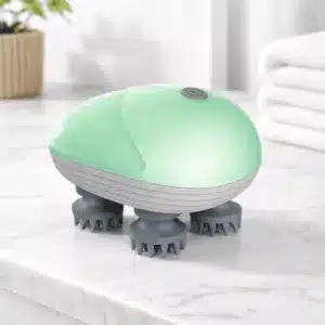 masseur de tête électrique vert pour massage relaxant du cuir chevelu