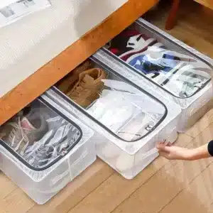 Boîte de rangement pour chaussures sous lit avec fenêtre transparente et fermeture zippée.