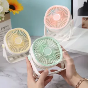 Mini ventilateur de bureau portable USB rechargeable avec support inclinable réglable.