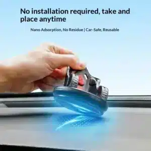 Support téléphone noir rotatif à 360 degrés fixé sur le tableau de bord d'une voiture avec base antidérapante.