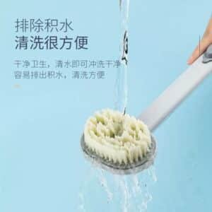 Brosse de douche avec distributeur de gel intégré