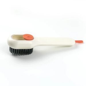 Brosse nettoyante avec réservoir et distributeur de savon intégré