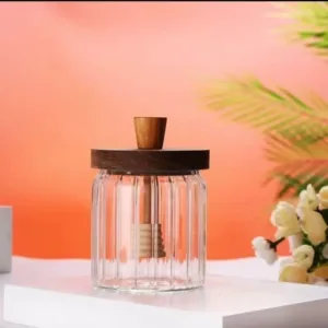 Pot à miel en verre avec cuillère intégrée et couvercle en bois
