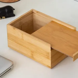 Boîte à mouchoirs en bambou naturel avec ouverture centrale et fond coulissant, distributeur élégant pour salon, chambre et bureau au Maroc.