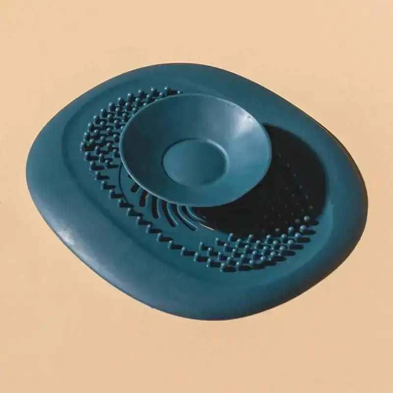 filtre-anti-cheveux-pour-evacuation-daau-bleu Filtre anti cheveux pour évacuation d'eau de douche avec ventouse centrale, disponible en plusieurs couleurs au Maroc.