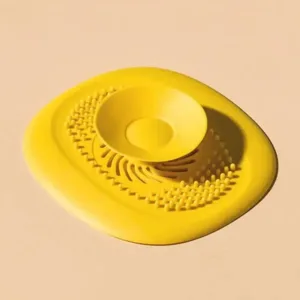 Filtre anti cheveux pour évacuation d'eau de douche avec ventouse centrale, disponible en plusieurs couleurs au Maroc.